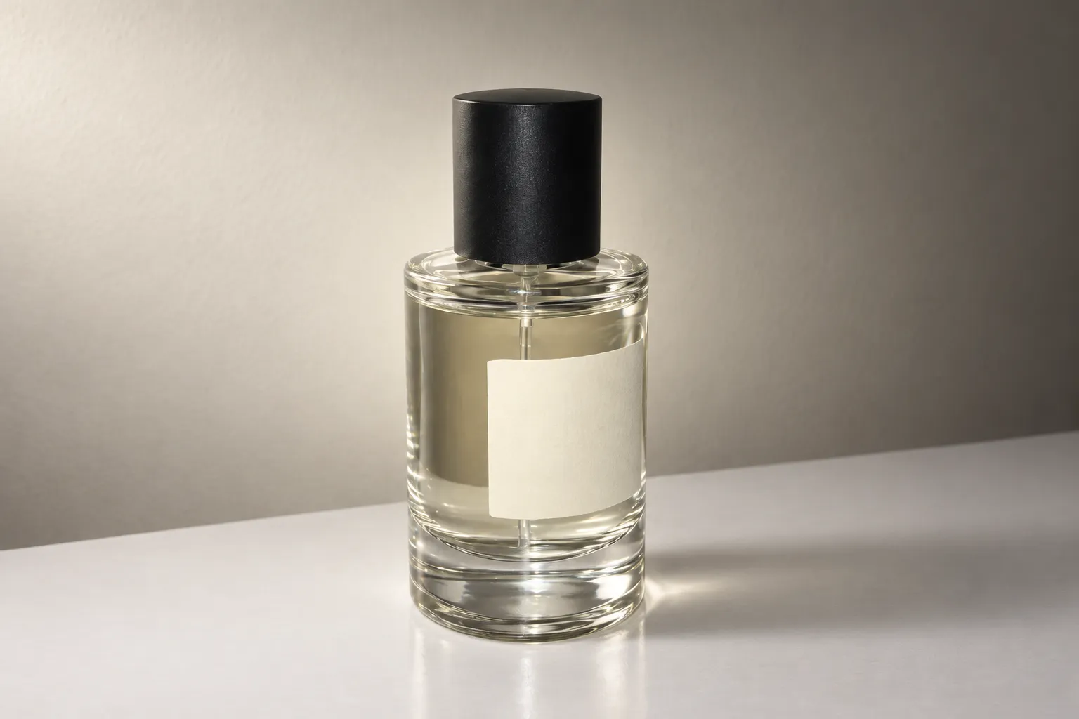 The same perfume bottle relit with soft studio light from the left and a glowing rim light.