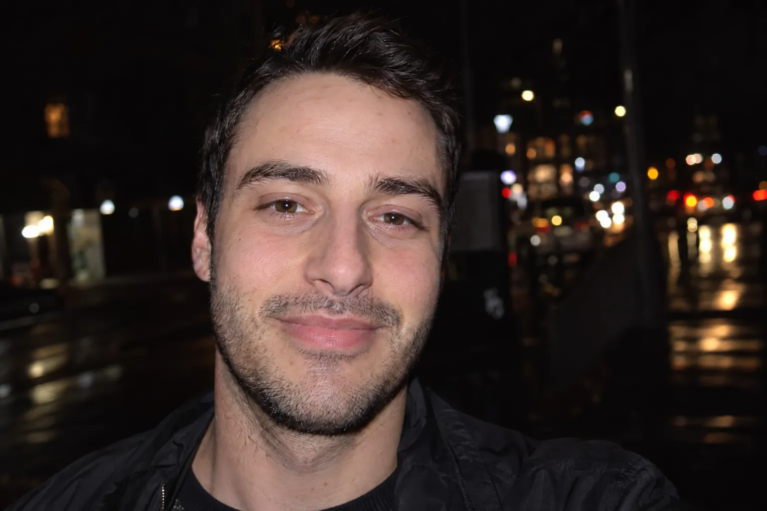 The same portrait with the flash glare removed and natural skin texture kept.